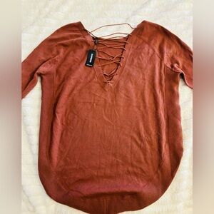 Vintage, Designer Express v-neck women’s sweater.